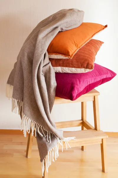 Colorful cushion throw cozy home mood — Stock Photo, Image