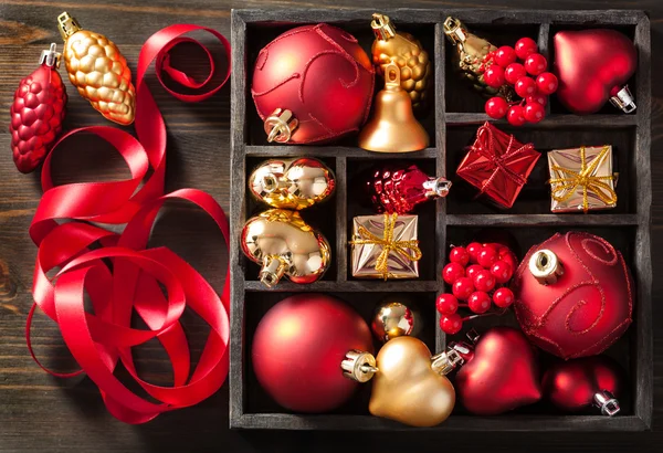 Christmas gift and decoration in wooden box — Stock Photo, Image