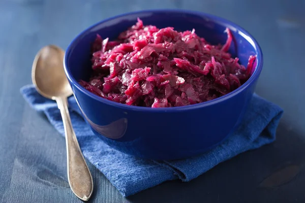 Pickled red cabbage in blue bowl — Stock Image Pickled red cabbage in blue bowl Royalty Free Stock Photos