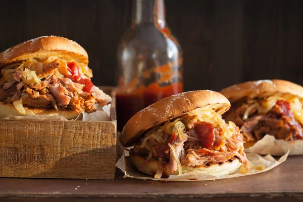 Homemade pulled pork burger with caramelized onion and bbq sauce — Stock Photo, Image