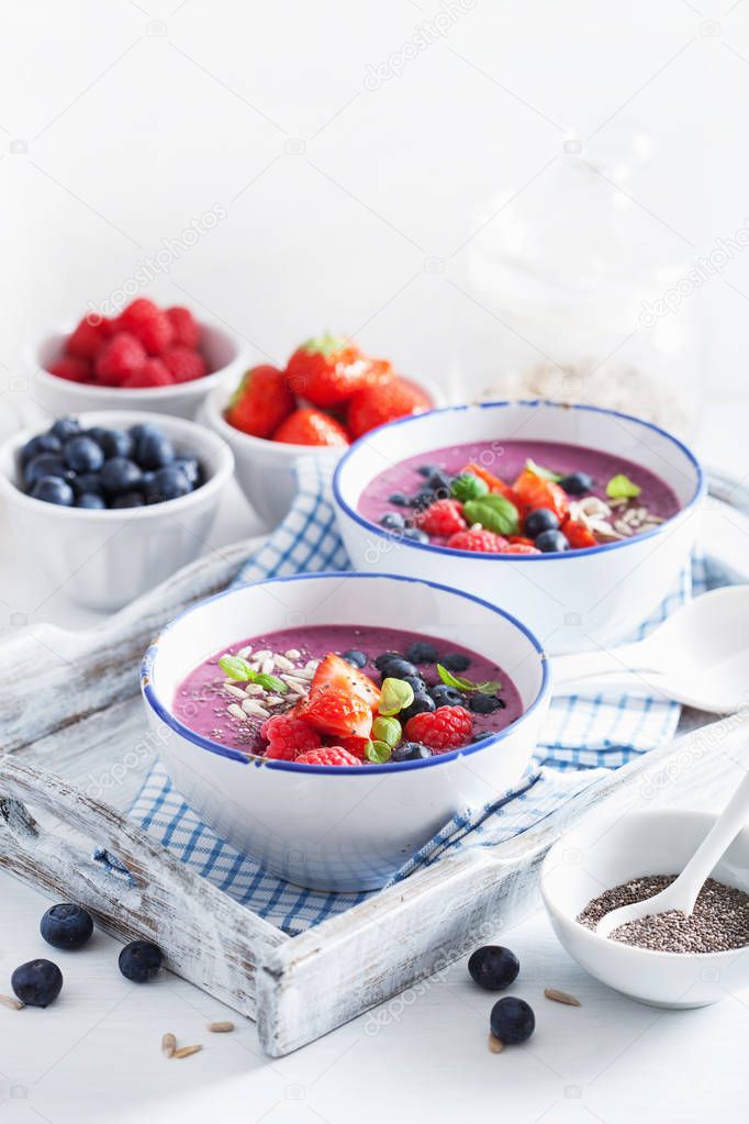 healthy berry smoothie bowl with strawberry blueberry raspberry 