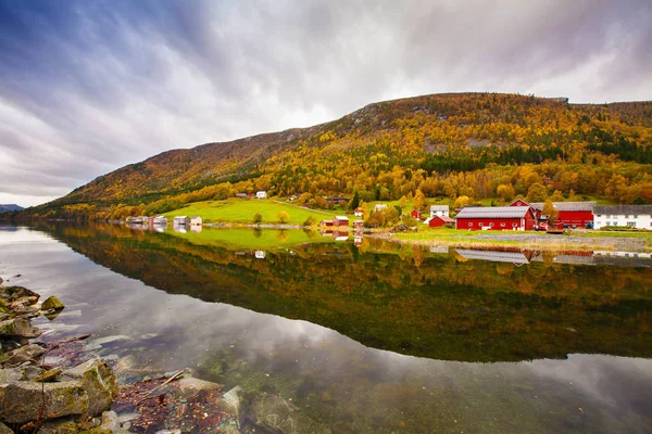 Autumn rural landscape with houses near river, Norway — Stock Photo, Image