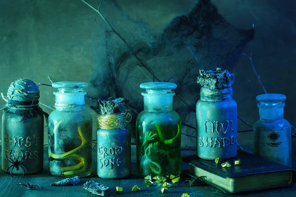 Witch apothecary jars magic potions halloween decoration — Stock Photo, Image