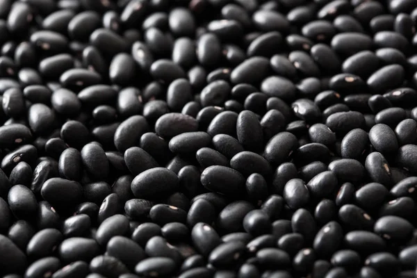 Black turtle beans legumes background — Stock Photo, Image
