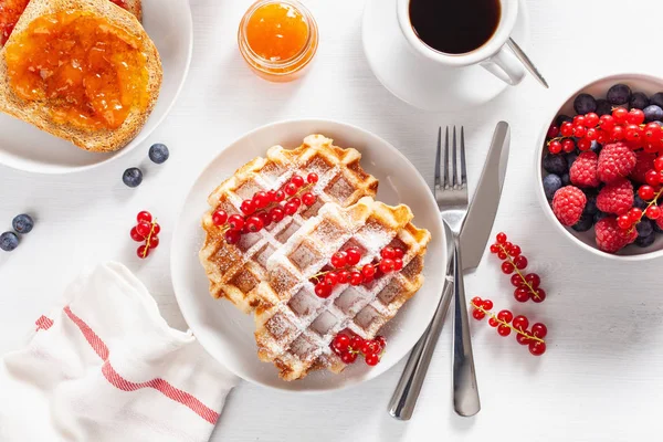 Breakfast with waffle, toast, berry, jam and coffee. Top view — Stock Photo, Image