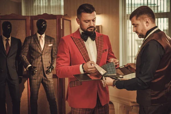 Extravagant man in tailor studio — Stock Photo, Image