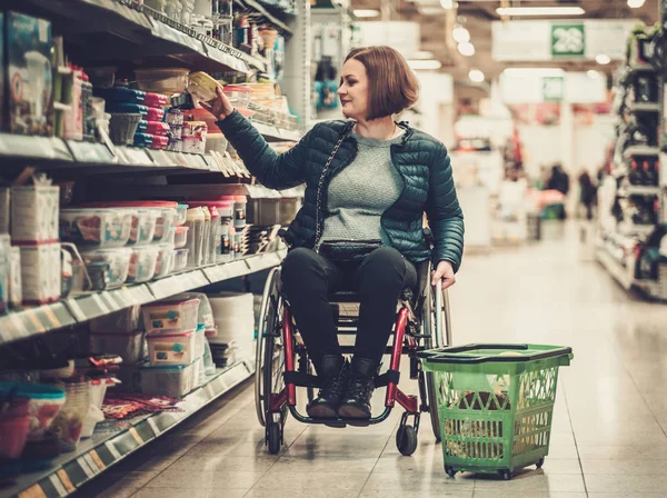 woman in a wheelchair in a department store