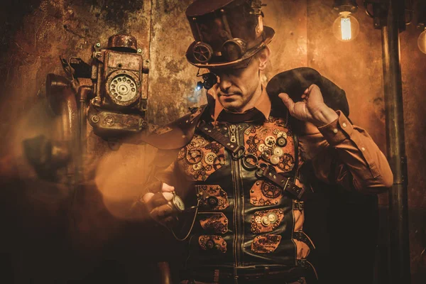 Steampunk style man with various mechanical devices — Stock Photo, Image