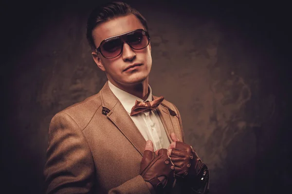 Sharp dressed man wearing jacket and bow tie — Stock Photo, Image