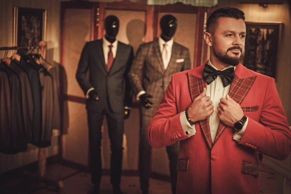 Extravagant stylish man in tailor studio — Stock Photo, Image
