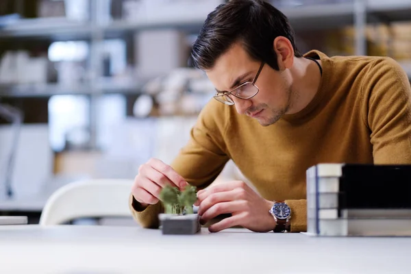 Man working with maquette in design — Stock Photo, Image
