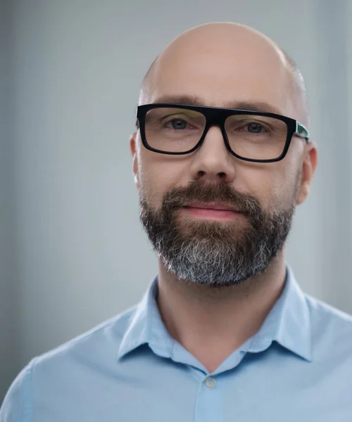 Bearded middle-aged man wearing glasses — Stock Photo, Image