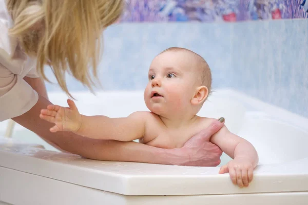 Baby boy getting an aquatic massage — Stock Photo, Image