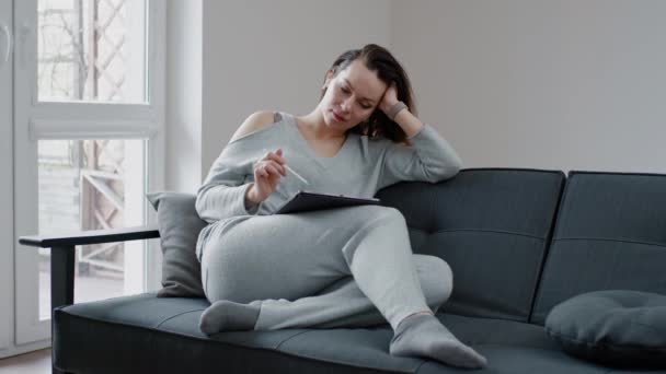 Woman with tablet pc at home — Stock Video