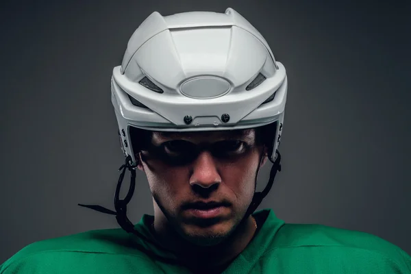 Hockey spiller med hjelm - Stock-foto
