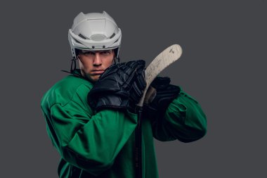 Hokey oyuncusu oyun sopa tutar