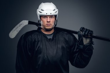 Hokey oyuncusu oyun sopa tutar
