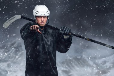 Hockey player in a snow storm.
