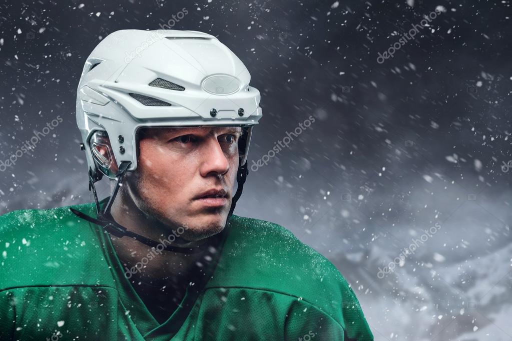Hockey player in a snow storm. Stock Photo by ©fxquadro 126591196