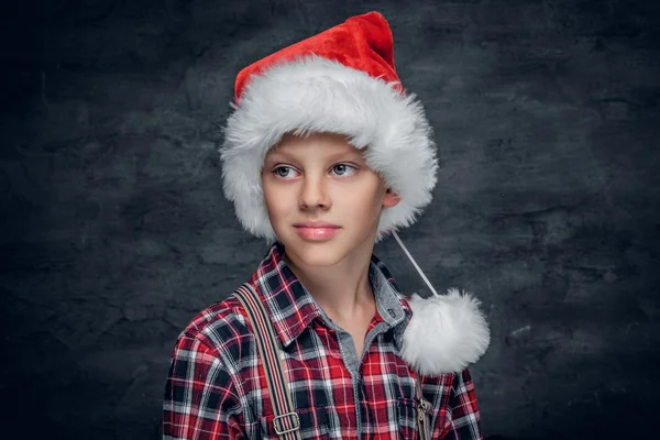 Cute boy in Santa's hat. — Stock Photo, Image