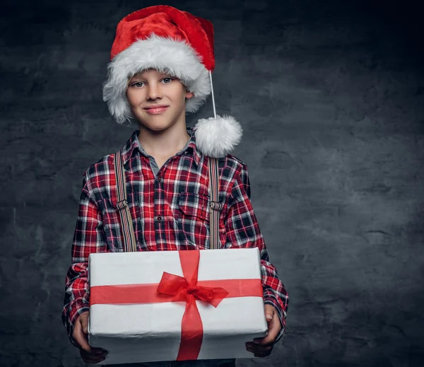 Cute boy holds gift box — Stock Photo, Image