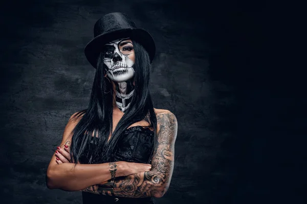 Girl in stylish top hat with skull make up. — Stock fotografie