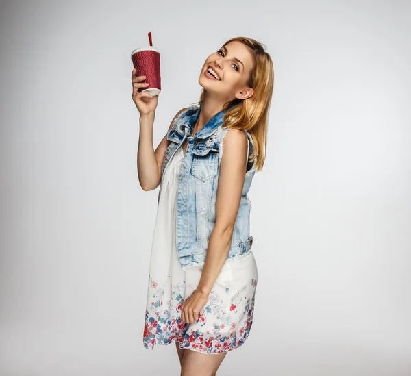 Blonde girl with cup of coffee — Stockfoto