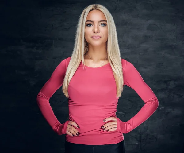 Ragazza in una maglia sportiva rosa . — Foto Stock