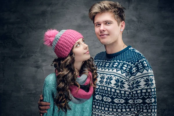 Female in winter hat and guy in warm sweater — Stock Photo, Image
