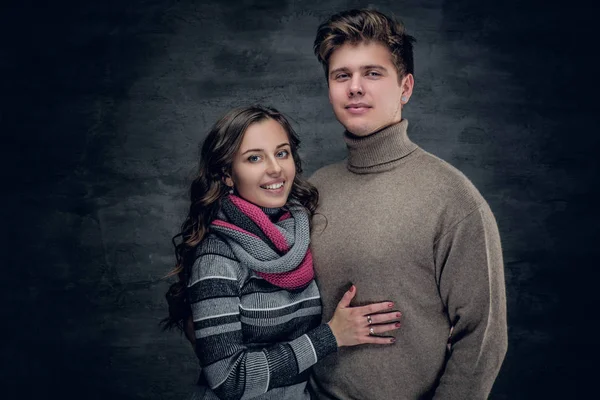 Urban couple in warm autumn sweaters — Stock Photo, Image