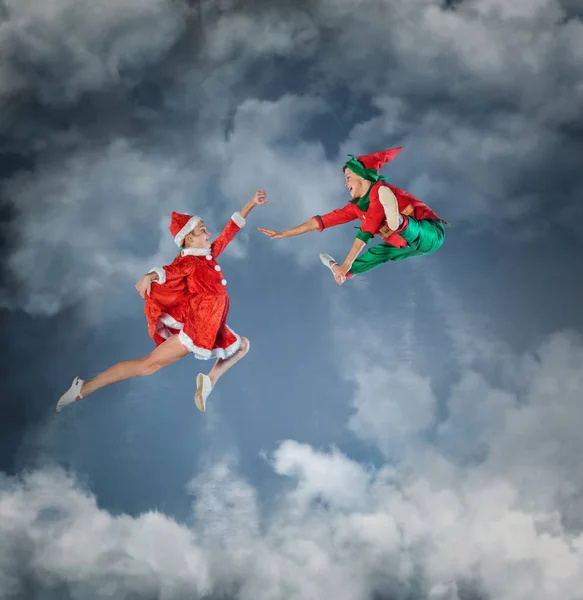 Funny kids in Peter pan and snow maiden costumes — Stock Photo, Image