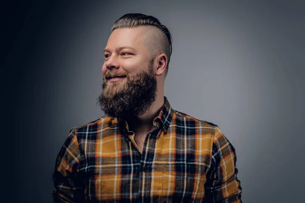 Laughing bearded man in yellow shirt — Stock Photo, Image