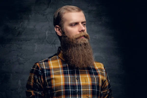 Hipster man dressed in a plaid shirt — Stock Photo, Image