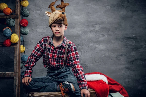 Boy dressed in a plaid shirt — Stock Photo, Image