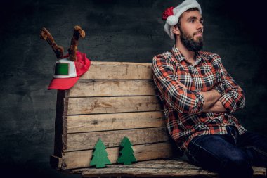 Noel Baba'nın şapkalı sakallı adam