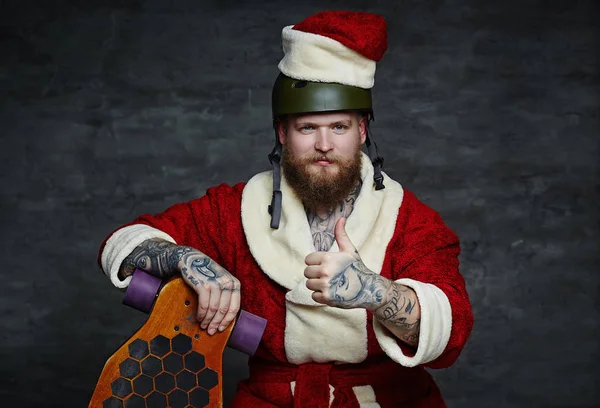 Barbudo vestido con el sombrero de Santa — Foto de Stock