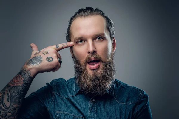 Bearded man with tattoos — Stock Photo, Image