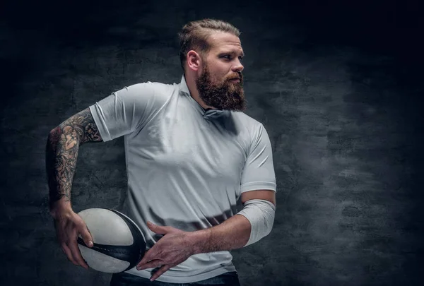 Brutal bearded rugby player in action. — Stock Photo, Image