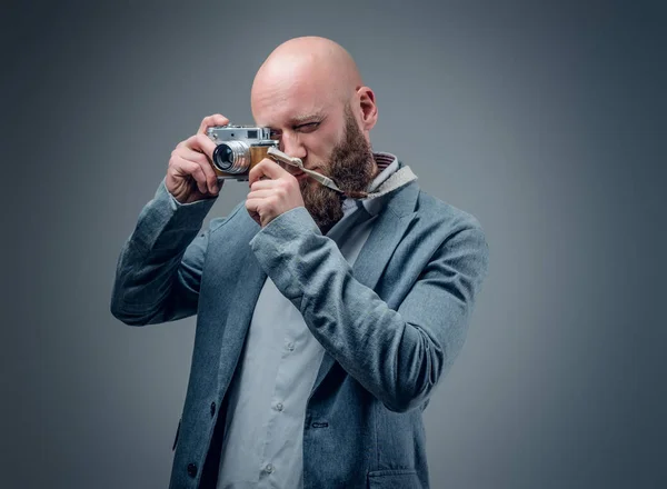 Hairless man with photo camera — Stock Photo, Image