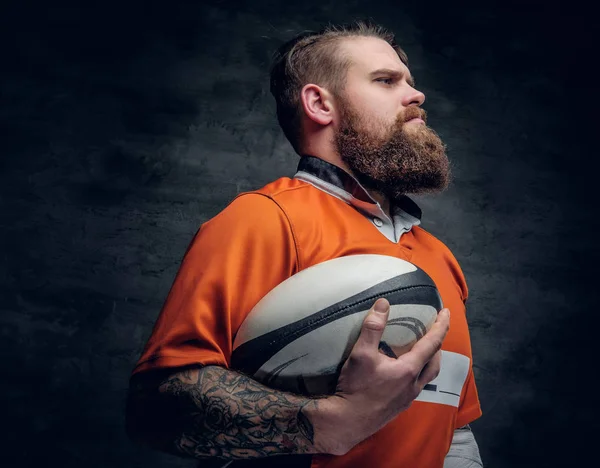 Rugby player holding game ball. — Stock Photo, Image