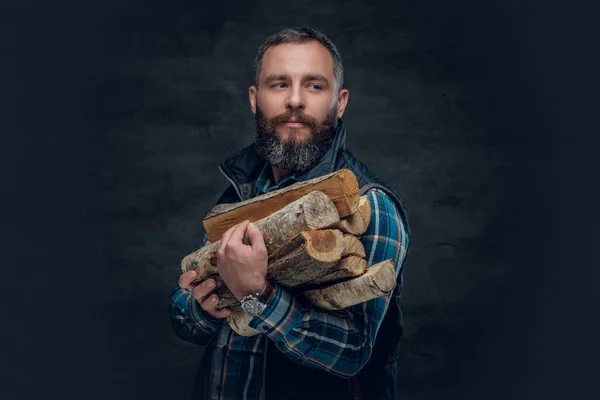 Man holding firewood