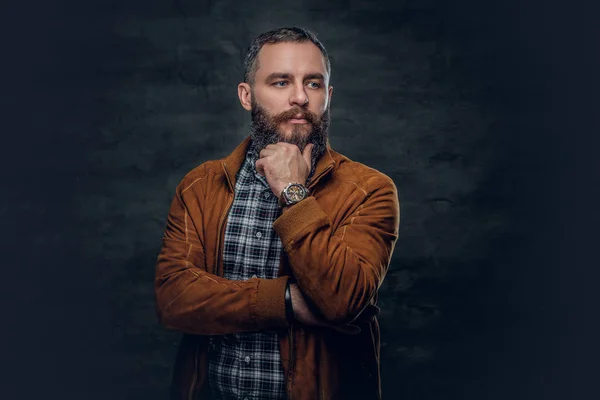 Man dressed in brown leather jacket