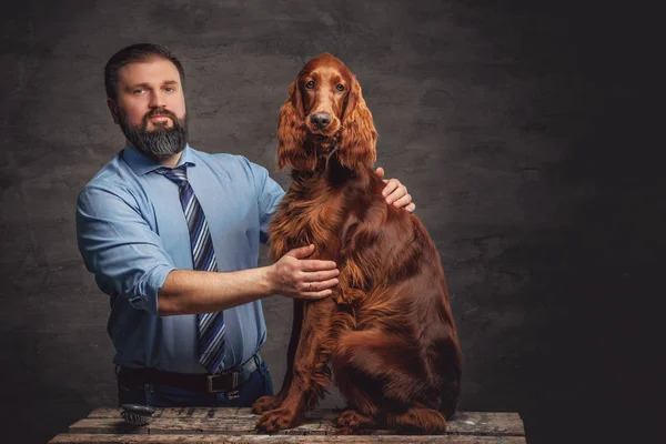 Man and his friend Irish setter Royalty Free Stock Images