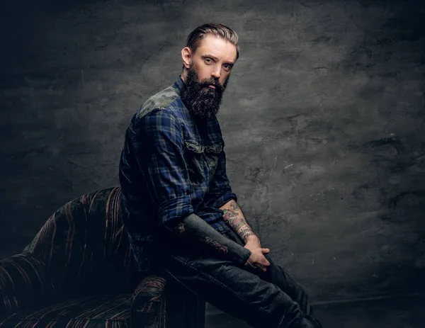 Man dressed in a plaid flannel shirt — Stock Photo, Image