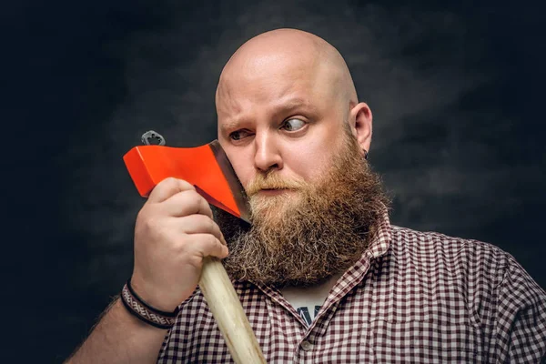 Baldhead man holding an axe — Stock Photo, Image