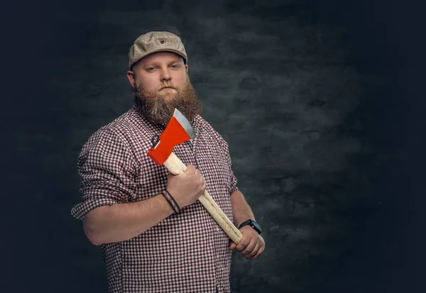 Bearded man holding an ax — Stock Photo, Image