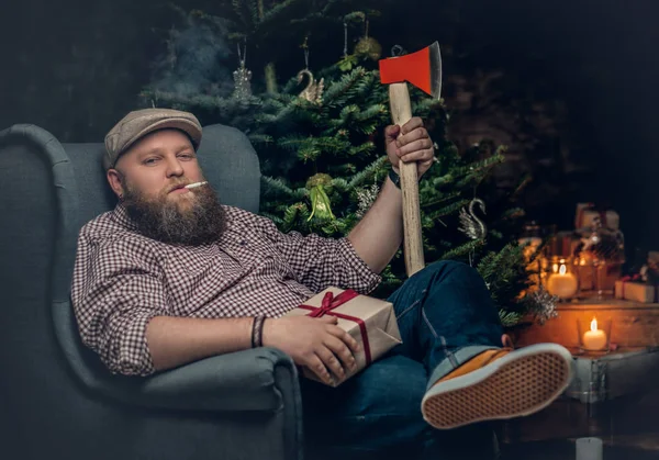 Bearded man holding an axe — Stock Photo, Image