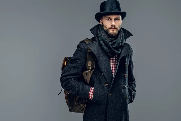 Elegant man holds backpack — Stock Photo, Image