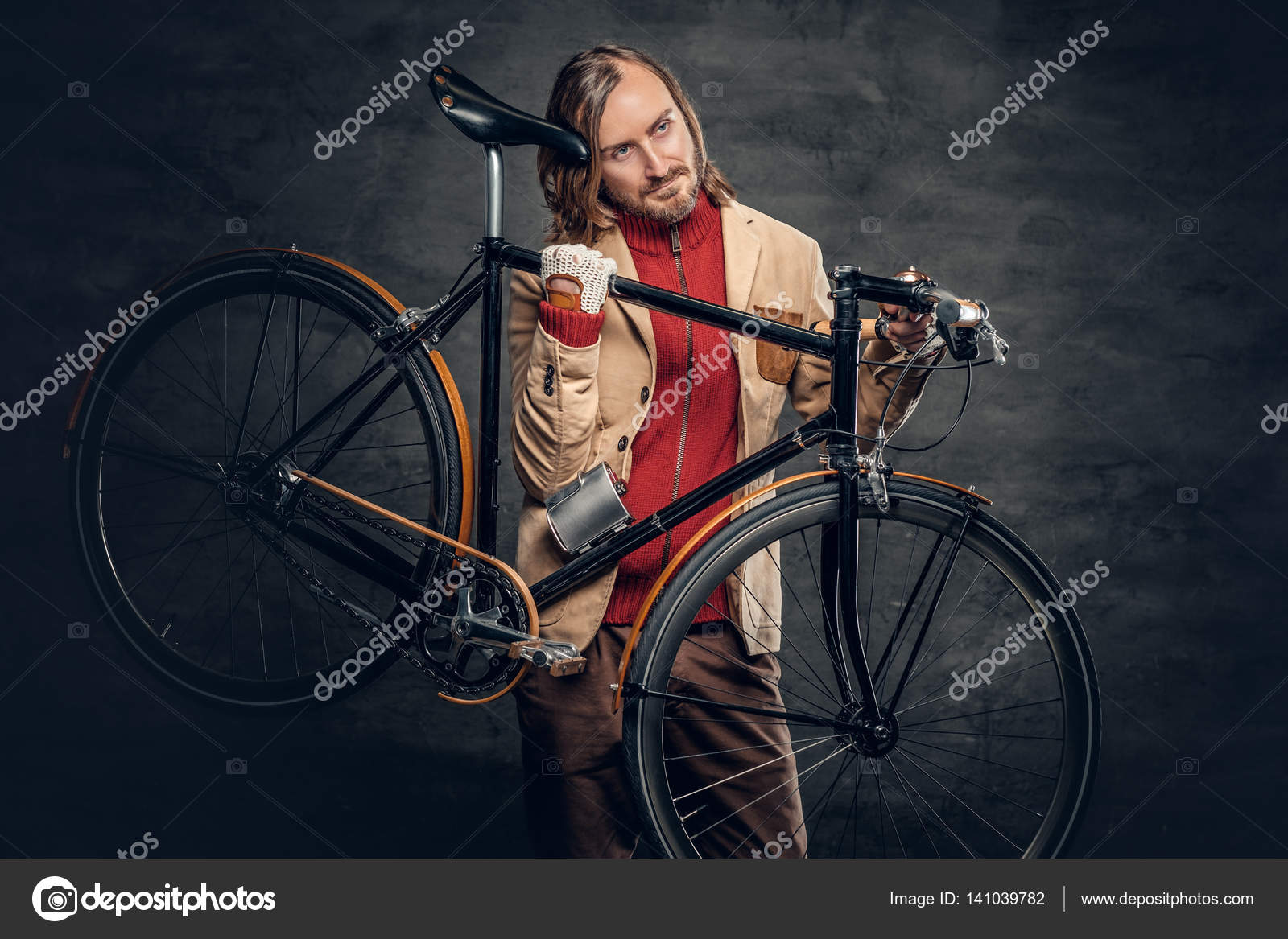 Man holds bicycle on his shoulder Stock Photo by ©fxquadro 141039782