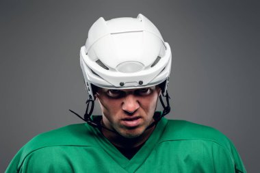 Hokey oyuncusu buz sopa tutar